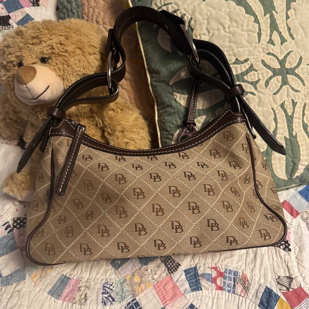 Dooney and Bourke Brown and Tan Elbow Bag with dark brown Fancy Leather Handle
